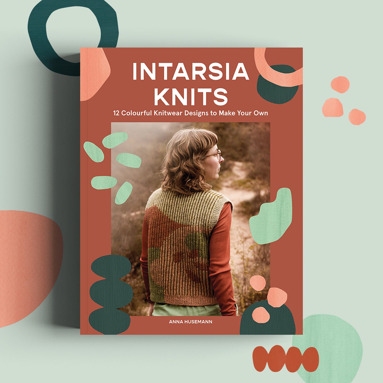 Cover of the book Intarsia Knits by Anna Husemann with colourful shapes. 